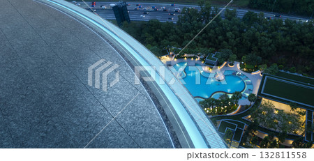 3d rendering modern building rooftop overlooking highway and urban swimming pool 132811558
