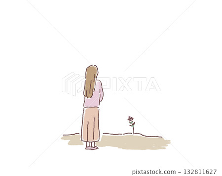 一位女子背對著鏡頭，凝視著一朵花。 132811627