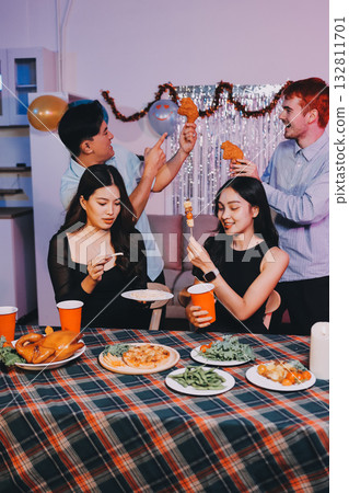 Diversity, dinner and group of people toast celebration together at party. Friends, happy and celebrate with food, wine and friendship for love, support and cheers champagne at business function Diversity, dinner and group of people toast celebration together at party. Friends, happy and celebrate with food, wine and friendship for love, support and cheers champagne at business function 132811701