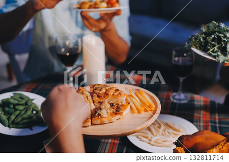Diversity, dinner and group of people toast celebration together at party. Friends, happy and celebrate with food, wine and friendship for love, support and cheers champagne at business function 132811714