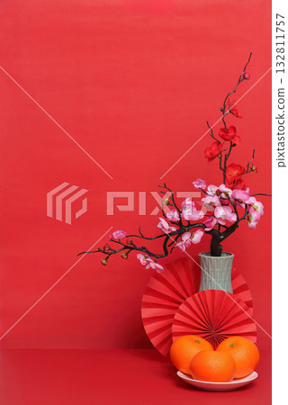 Background with Cherry Blossom and Oranges for Lunar New Year Celebration 132811757