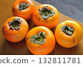 Aizu persimmons on a wooden table 2 Aizu persimmons on a wooden table 2 132811781