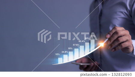 Young man with smartphone hand touching to visualize money growth The phone screen displays graphs Young man with smartphone hand touching to visualize money growth The phone screen displays graphs 132812093