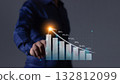 Young man hand touching to visualize money growth The screen displays graphs and charts 132812099