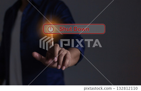 Young man hand touching Shut Down button press power OFF Young man hand touching Shut Down button press power OFF 132812110