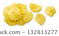 Pile of potato chips and scattered close-up on a white background. Top view 132813277