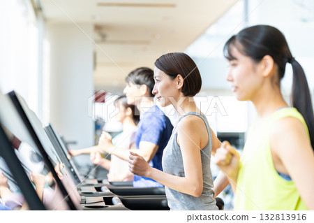 A middle-aged woman running at the gym. Photo courtesy of Sports Club & Sauna Spa Renaissance Makuhari 24 132813916