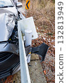 A passenger car that collided with a guardrail and sustained damage to the left front 132813949