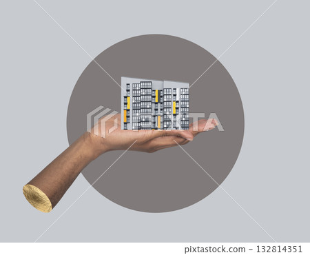 Urban building in hand concept. African American male holding modern high rise collage, showing real Urban building in hand concept. African American male holding modern high rise collage, showing real 132814351