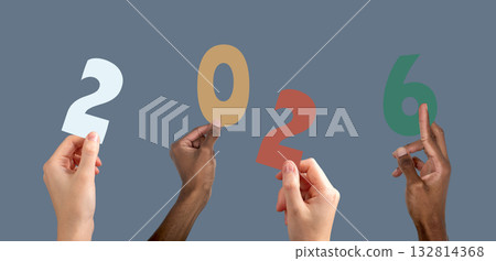 2026 new year celebration. Multiethnic group raising colorful hands with numbers and letters, 132814368