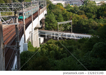 The intersection of the Kobe Municipal Subway and Shinkansen lines in Kobe General Park The intersection of the Kobe Municipal Subway and Shinkansen lines in Kobe General Park 132815140