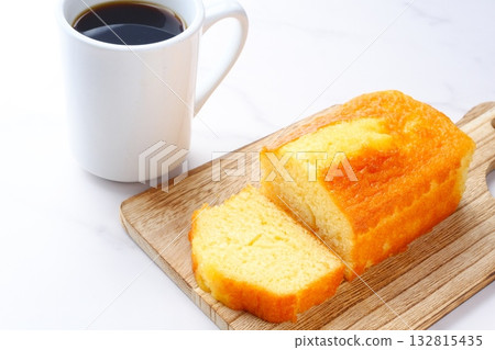 Pound Cake and Coffee - Enjoy a light snack of fluffy pound cake and freshly brewed coffee. Pound Cake and Coffee - Enjoy a light snack of fluffy pound cake and freshly brewed coffee. 132815435