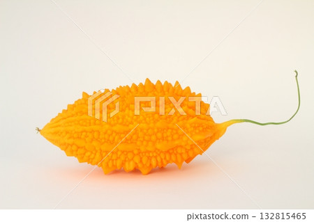 Momordica charantia isolated on a white background. Ripe whole fruits of Momordica charantia Momordica charantia isolated on a white background. Ripe whole fruits of Momordica charantia 132815465