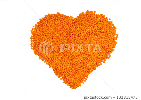 Pile red lentil in shape of heart isolated on white background. Top view. Flat lay. Vegetarian and vegan diet. High content of B vitamins in Red lentils. healthy Superfood Pile red lentil in shape of heart isolated on white background. Top view. Flat lay. Vegetarian and vegan diet. High content of B vitamins in Red lentils. healthy Superfood 132815475