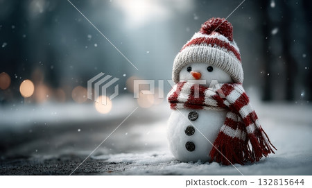 a snowman standing in a snowy field 132815644