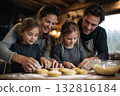Family baking mince pies together in a cozy kitche 132816184