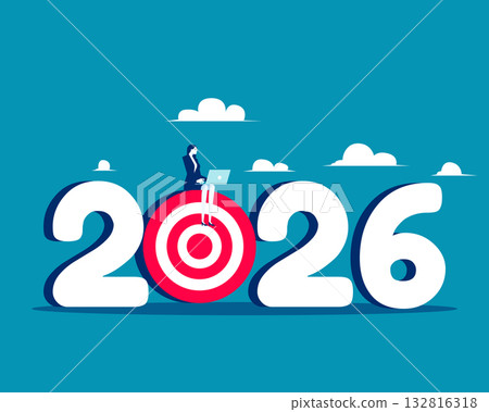 2026. Businesswoman using laptop sitting on archery target 2026 2026. Businesswoman using laptop sitting on archery target 2026 132816318