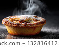 Close-up of freshly baked mince pie with powdered sugar on top on black background 132816412
