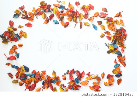 Flowers composition. Frame made of dried rose flowers, petals, and leaves. Top view with copy space. Flowers composition. Frame made of dried rose flowers, petals, and leaves. Top view with copy space. 132816453