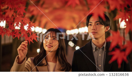 A couple who came to see the illuminated autumn leaves A couple who came to see the illuminated autumn leaves 132816636