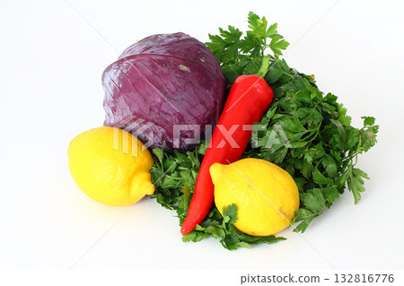 red cabbage, carrot, lemon, pepper, parsley isolated on white background. red cabbage, carrot, lemon, pepper, parsley isolated on white background. 132816776