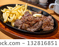 Juicy fillet steak and french fries Juicy fillet steak and french fries 132816851