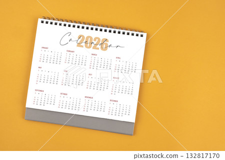 2026 yearly desk calendar on yellow color background, Flat lay. 2026 yearly desk calendar on yellow color background, Flat lay. 132817170