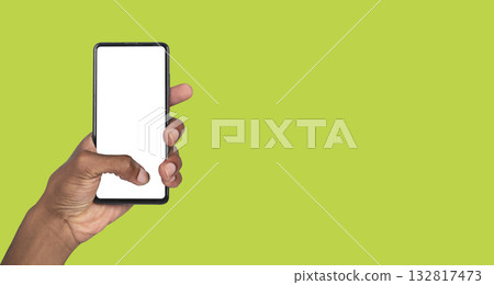 Hand displaying empty smartphone for mobile marketing, product launch visuals or creative Hand displaying empty smartphone for mobile marketing, product launch visuals or creative 132817473