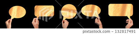 Hand holding golden speech bubble. Shiny metallic shape with bright reflection, elegant texture and 132817491