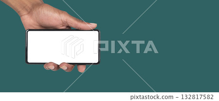 Smartphone display mockup in a hand, perfect for creative promotion, online advertising or UX 132817582