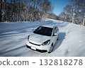 Image of studless tires on a car running on a snowy road Asahikawa City, Hokkaido 132818278