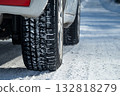 Image of studless tires on a car running on a snowy road Asahikawa City, Hokkaido 132818279