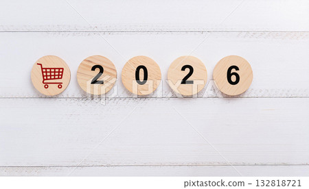 Red Shopping Cart Icon with Wooden Round Discs Displaying the Year 2026 132818721