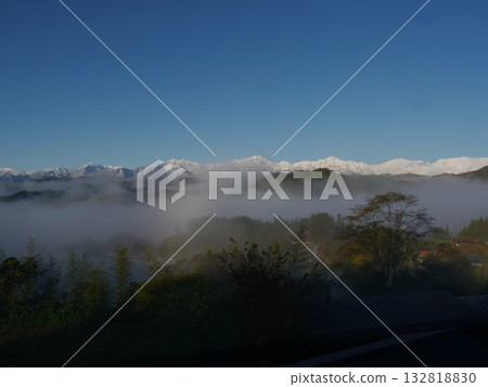 Snowy scenery of the Ushiro-Tateyama mountain range seen from Ogawa Village, Nagano Snowy scenery of the Ushiro-Tateyama mountain range seen from Ogawa Village, Nagano 132818830