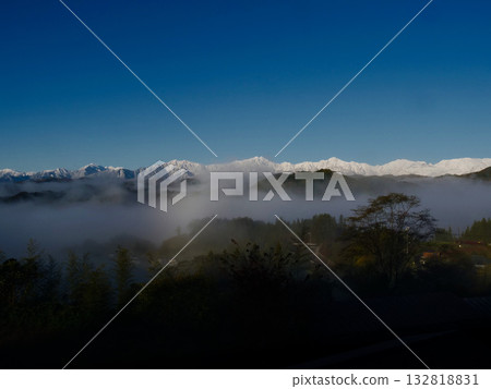 Snowy landscape of the Ushiro-Tateyama mountain range seen from Ogawa Village 132818831