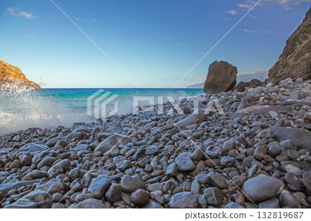 Rocky beach with waves on Madeira Rocky beach with waves on Madeira 132819687