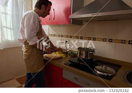Chef Father Cooking Soup With Son In Kitchen, Family Dinner Prep 132820182