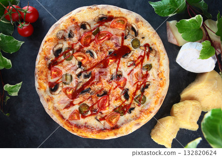 Pizza with hot peppers is Mexican. Jalapeno pepper. Mozzarella cheese and tomato sauce in pizza. Top view. 132820624