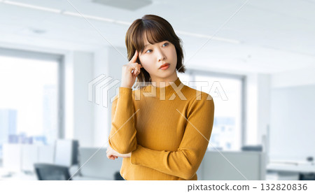 A woman thinking/businesswoman A woman thinking/businesswoman 132820836