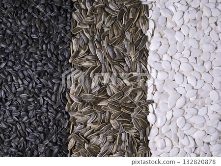 Various seeds as background, close up view. Various seeds as background, close up view. 132820878