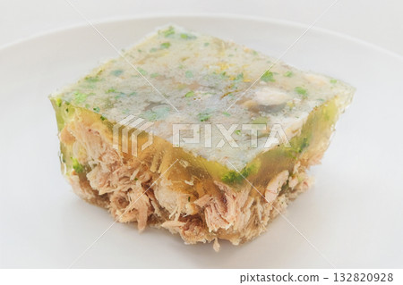 Aspic in plate. Homemade food on a white background. Cooking at home. Aspic in plate. Homemade food on a white background. Cooking at home. 132820928