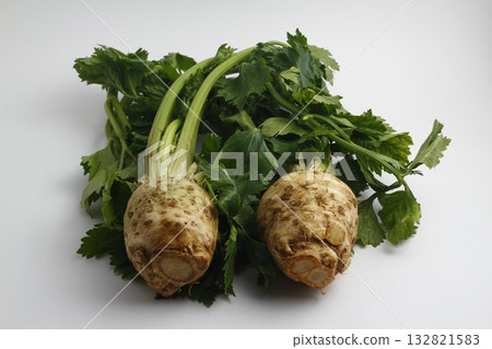 Fresh organic celery isolated on white background. Fresh organic celery isolated on white background. 132821583