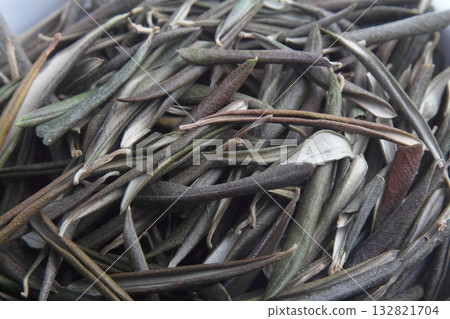 Real olive green fallen leaves, isolated on white background, close-up flat lay top view. 132821704