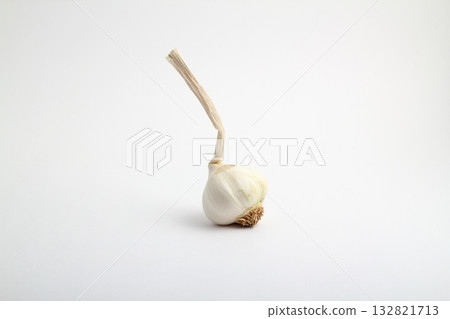 Garlic Bulbs and Peeled Garlic Cloves Isolated on White Background Garlic Bulbs and Peeled Garlic Cloves Isolated on White Background 132821713