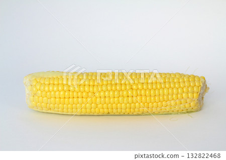 Raw corn on a white the background 132822468