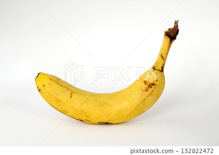 Fresh banana isolated. Ripe organic split banana on white background. Cut out with clipping path Fresh banana isolated. Ripe organic split banana on white background. Cut out with clipping path 132822472