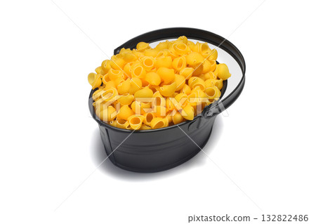 Italian pasta on a round dish on a white background Italian pasta on a round dish on a white background 132822486