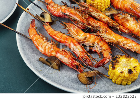Grilled shrimp skewers and langoustines. 132822522