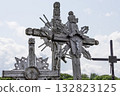 Ornate crucifixes at the Hill of Crosses, Lithuania, with intricate carvings 132823125