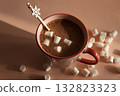 Hot Chocolate with Marshmallows and Snowflake Spoon in Pink Mug 132823323